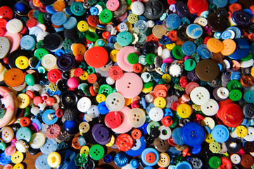 Sewing buttons background. Colorful sewing buttons texture