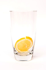 Lemon slices in empty glass prepare for water become a popular morning healthy beverage