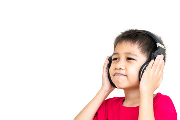 Asian boy wearing a red shirt and wear wireless headphones to listen to music and smiling happily.