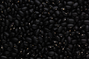 Black kidney beans closeup top view background. Healthy protein food.