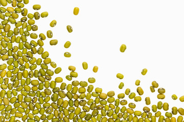 Border of mung green beans closeup with copy space on white background. Isolated. Healthy protein food.