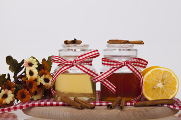 Honey in jar on a wooden background