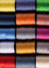 Colorful cotton reels viewed from above