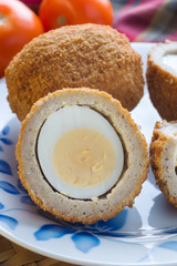 Scotch eggs a hard boiled egg wrapped in pork sausage meat and breadcrumbs a favourite picnic snack