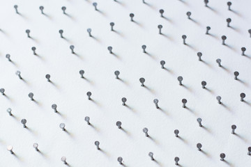 Group of Concrete nails Galvanized dip color on white paper back