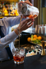 Pouring cocktail drink