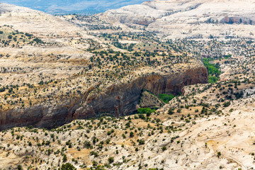 Fototapeta na wymiar Deep canyon, rocks and mountains