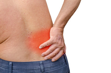 Naklejka premium close up of a Senior man holding his back in pain, monochrome photo with red as a symbol for the hardening