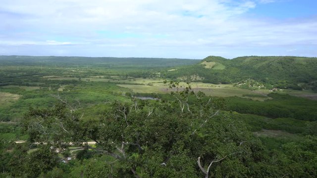 Panoramic view of the tropical valley with hills at summer sunny day