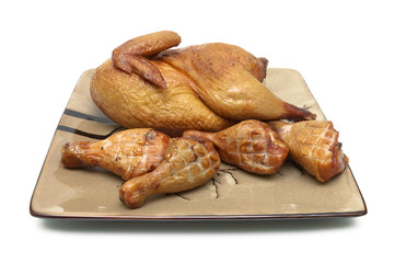 smoked chicken and grilled chicken legs on the plate