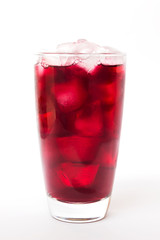 Summer drink; fresh grapes juice on ice in glass isolated on white background