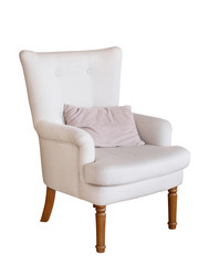 soft armchair with a pillow isolated on white. Armchair with fabric upholstery