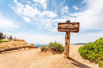 Warning sign in mountains valley.