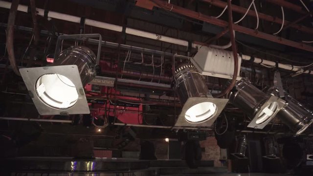 Theatrical spotlights on the soffit