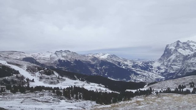 The view from the window of a train of the Alps in winter, Switzerland.