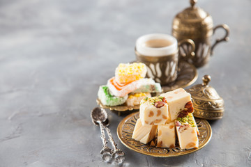 coffee and oriental sweets - locum and sherbet, selective focus, copy space