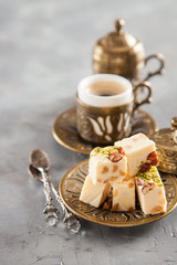 coffee and oriental sweets - locum and sherbet, selective focus, copy space