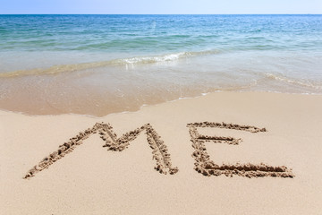 Me text written at the sand beach