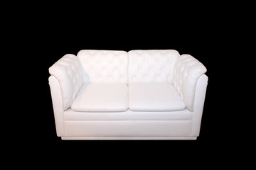 Modern white sofa isolated on black background