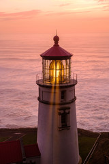 Fototapeta na wymiar Heceta Head Lighthouse at sunset, built in 1892