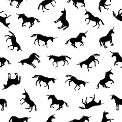 Seamless pattern. Silhouettes of unicorn