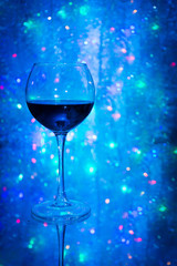 Glass of wine on the background bokeh