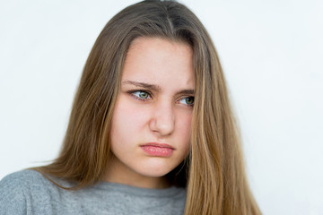 Teenager girl emotional posing isolated