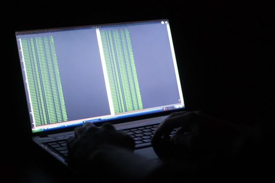 Russian hacker hacking the server in the dark