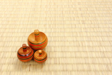 Traditional triple tops put on Tatami flooring mat