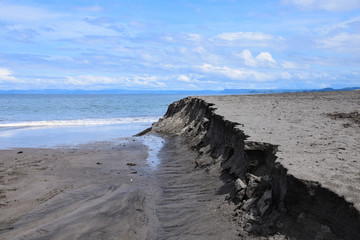 Coastal erosion with sand washed away from the each following Hurricane Otto, Guanacaste, Costa...