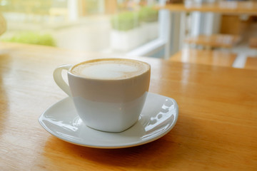 Hot coffee on table.