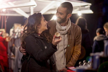 Young couple in love in the city walks