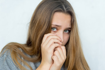 Naklejka premium Teenager girl emotional posing isolated