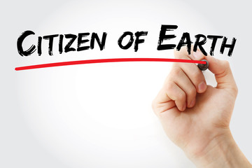 Hand writing Citizen of Earth with marker, concept background