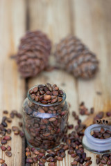 Cedar nuts and cones on wooden table