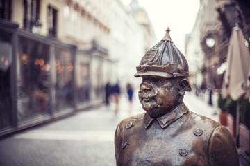 Strict gendarme with mustache sculpture