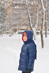 Fototapeta na wymiar Portrait of a child in winter season