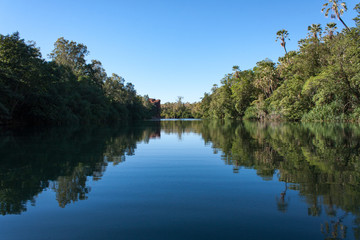 Fototapeta premium Reflections on Lawn Hill creek on a morning