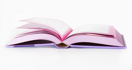 Isolated pink open book in lilac cover