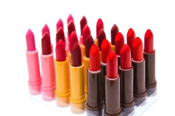 Obraz premium set of lipsticks red color on white background