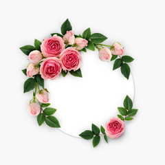 Pink rose flowers and buds arrangement on white circle card