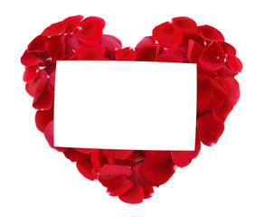 beautiful heart of red rose petals and greeting card isolated on