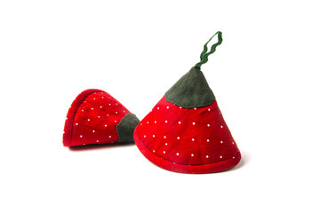 two potholders strawberries for hot dishes on a white background