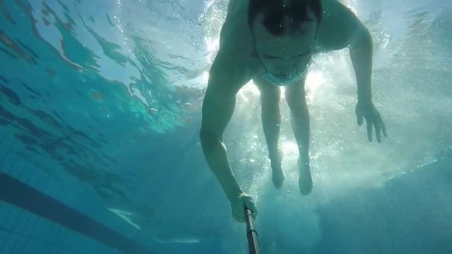 Man running on water in slow motion.