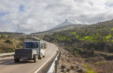 Van with trailer moving towards Feria Castle Hill