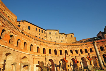 Obraz premium Roma il Foro di Traiano al tramonto: mercati traianei
