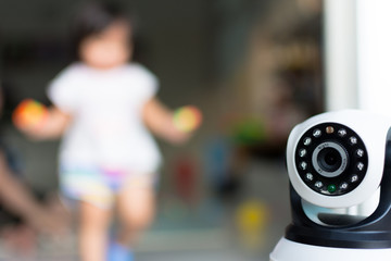 The CCTV security camera operating in home.