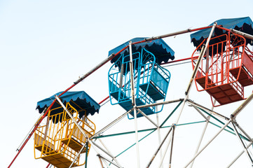 Ferris wheel Player of the fun kids with blue sky,Old and vintage Ferris wheel