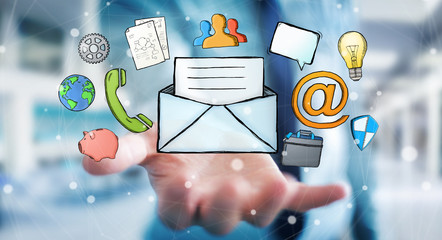 Businessman holding manuscript contact icon in his hand