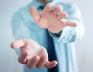 Businessman showing his empty hand
